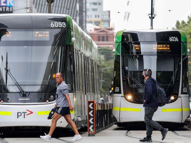 MELBOURNE , AUSTRALIA - NewsWire Photos 22 FEBRUARY, 2021 :  Commuters head to Southern Cross Station in Spencer St. on the first day of the Covid-19 vaccine roll out. Picture : NCA NewsWire  /  Ian Currie