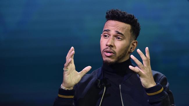 Formula One champion Lewis Hamilton is copping it on social media over a video of him shaming his young nephew for wearing a dress. (Flavio Lo Scalzo/ANSA via AP)