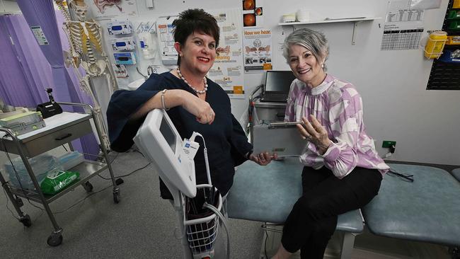 Patient Patricia Arguello de Avila in the doctors’ rooms on Monday with Tracey Johnson, chief executive of Inala Primary Care in Brisbane. Picture: Lyndon Mechielsen