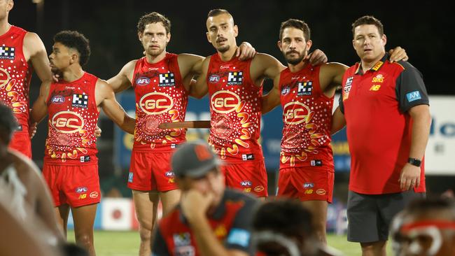 Territory Suns Malcolm Rosas, Jy Farrar, Joel Jeffrey, Ben Long and coach Stuart Dew, ahead of the match against Western Bulldogs. Picture: Michael Willson/AFL Photos via Getty Images