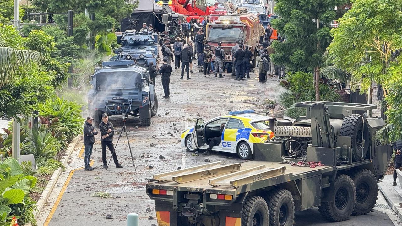 Soldiers, tanks, debris: Brisbane street turned into war zone