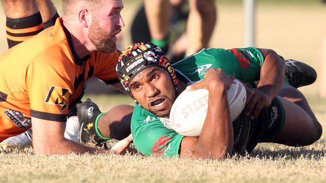 Rugby League Gold Coast (RLGC) A Grade clash between Helensvale Hornets (Green/Yellow) and Southport Tigers (Orange). Brent Barnes scoring. 20 June 2021 Helensvale Picture by Richard Gosling