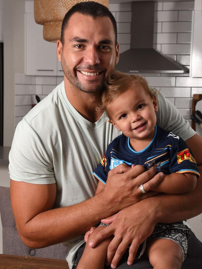 James with his son Brooklyn at home.