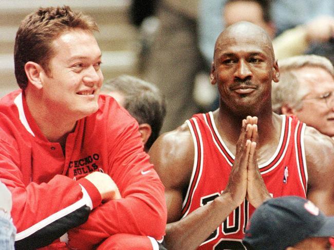 Apr 29 1998 : Chicago Bulls' Luc Longley (L) & Michael Jordan celebrate in East Rutherford  following victory over New Jersey Nets in first round of NBL playoffs.Basketball sport o/seas headshot