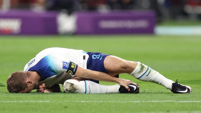 Harry Kane goes down with an injury at Khalifa International Stadium. Picture: Richard Heathcote/Getty Images