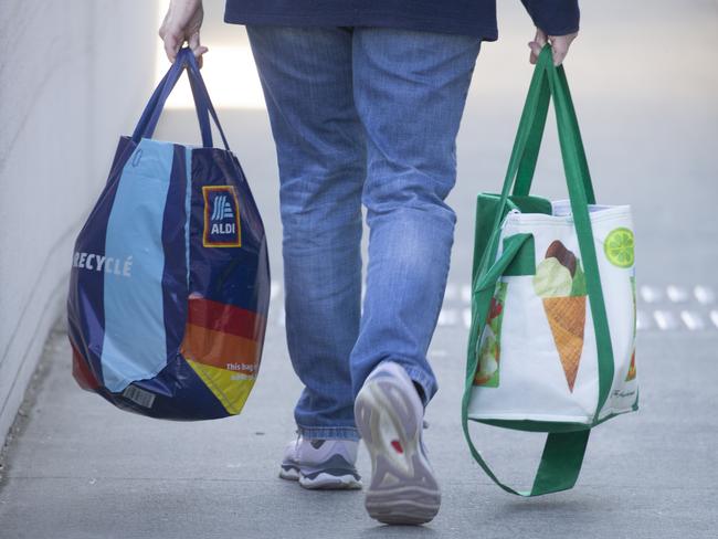 BRISBANE, AUSTRALIA - NewsWire Photos - JUNE 19, 2024: Generic photo of Australian shopping centre ALDI and Woolworths bags.Picture: NewsWire / Glenn Campbell