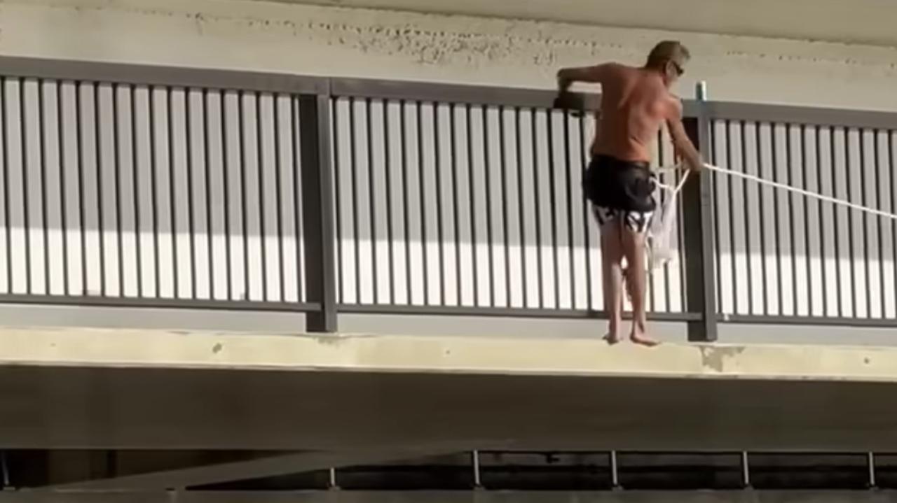 A man wearing nothing more than black boardies and a bungee rope can be seen jumping from a bridge near Perth. Picture: Facebook