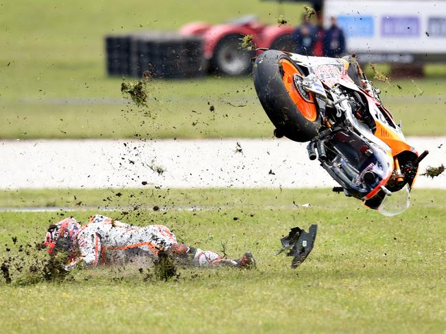 Marc Marquez of Spain for the Repsol Honda Team crashes at the hairpin in 2016.