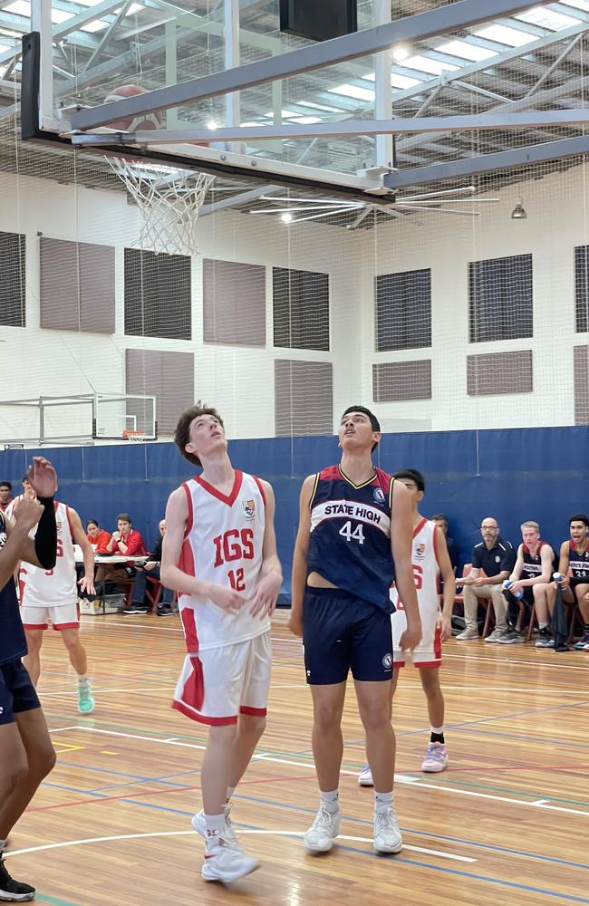 State High's Kayden Ikatau (right) and Ipswich Grammar's Harrison McAuliffe (left).