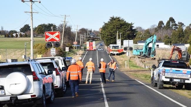 A Victorian man has died after an excavator he was driving rolled at Evandale, Tasmania, 20/07/2022, while he was performing subcontracting work. Picture: Alex Treacy