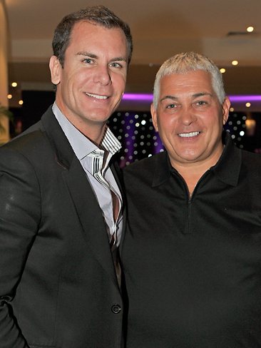 Mick Gatto and ex-AFL star Wayne Carey at the Miss World lunch in 2011. Picture: Cameron Tandy