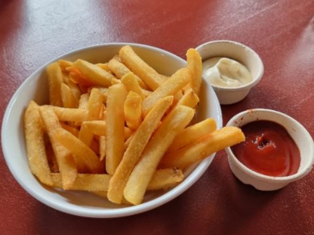 The social media user added that they also purchased a small container of mayonnaise for an additional $2 to dip their $12 bowl of hot chips into. Picture: Reddit/retailstaffparking