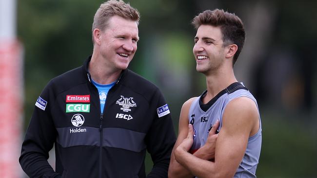 Josh Daicos with coach Nathan Buckley at training on Tuesday. Picture: Michael Klein