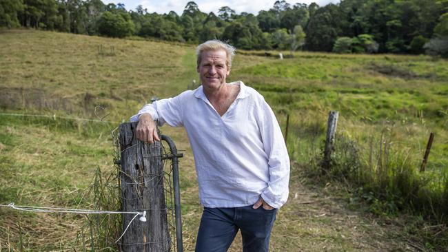 Michael Johnston at his Maleny property was connected with his birth father through a DNA test. Picture: Mark Cranitch.