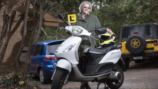 Janz Reinecke with her motor scooter she purchased in order to access the Sydney Metro at Cherrybrook. Picture: Troy Snook