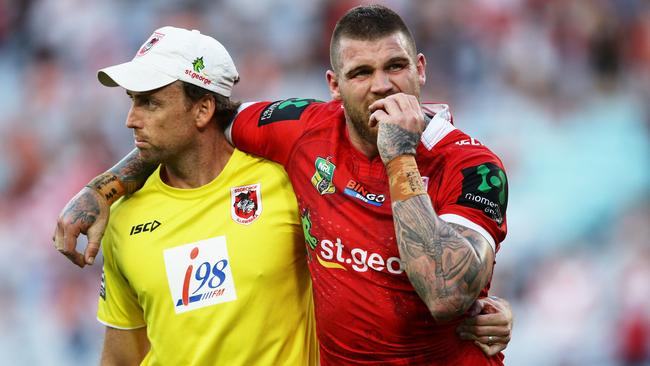 Josh Dugan is helped off the field after injuring his hamstring.