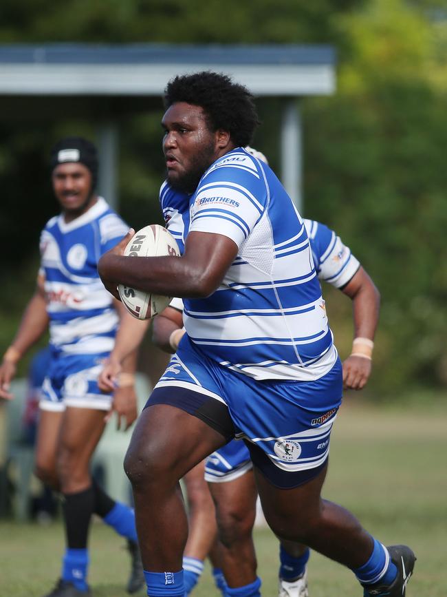 Henry Williams puts in a storming run in the Cairns District Rugby League (CDRL) Round 16 match between the Ivanhoe Knights and Cairns Brothers, held at the Smithfield Sporting Complex. Picture: Brendan Radke