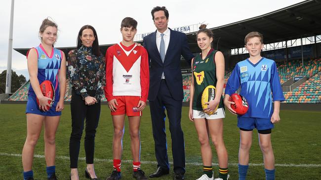 From left, Lindisfarne junior footballer Ainsley Spong, AFL Tasmania CEO Trisha Squires, Clarence’s Liam Howard, AFL CEO Gillon McLachlan, Clarence and Tasmania State Academy player Tahlia Bortignon, and Fletcher Horne, from Lindisfarne. Picture: LUKE BOWDEN