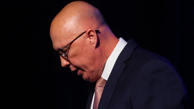 Australia's Opposition Leader Peter Dutton leaves the stage after conceding defeat in the general election at the Liberal Party election night event in Brisbane on May 3, 2025. Australia's right-leaning opposition leader Peter Dutton conceded defeat in a general election on May 3, saying he had spoken to Prime Minister Anthony Albanese. (Photo by Patrick Hamilton / AFP)