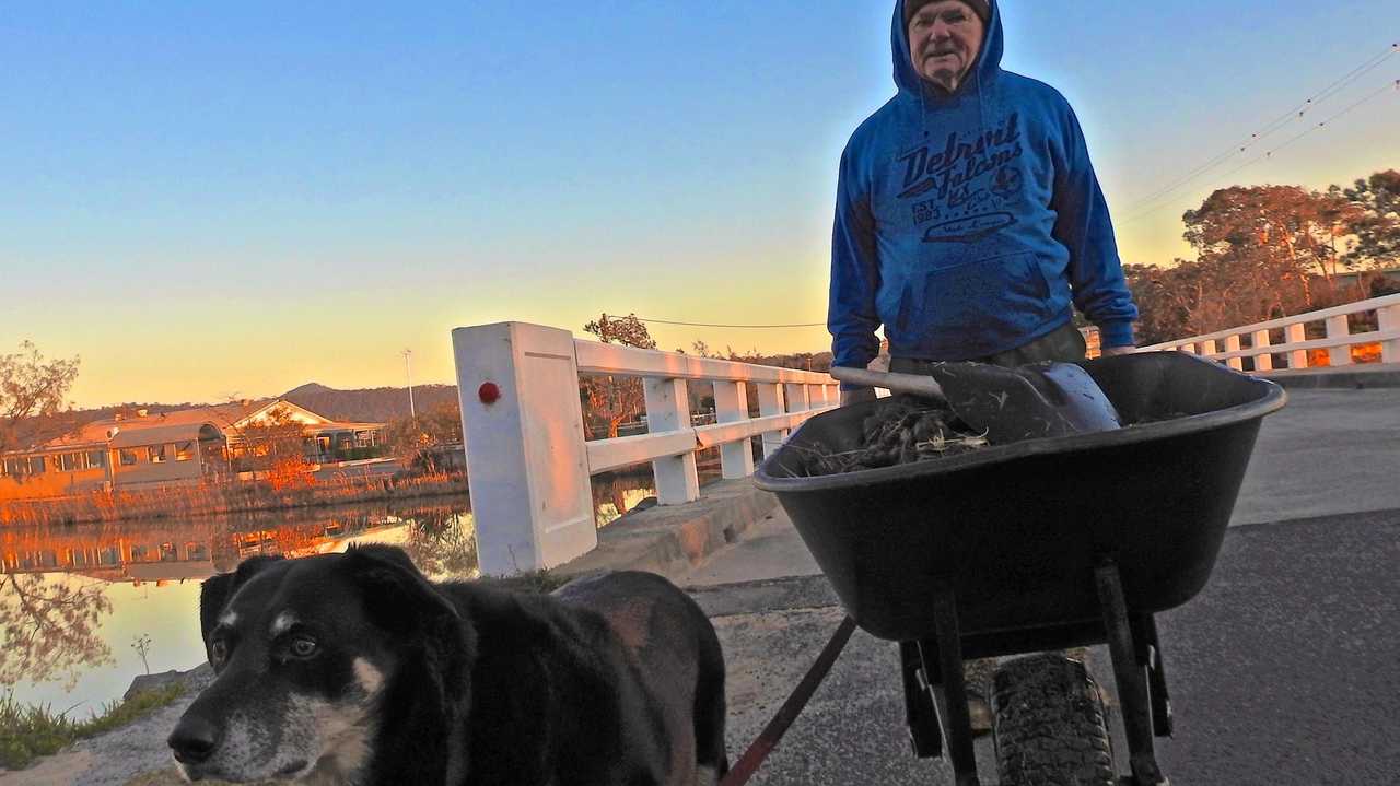 Kenny Parker is missing after going fishing in Brooms Head. Here he is with his dog Digger. Picture: Stephen Otton