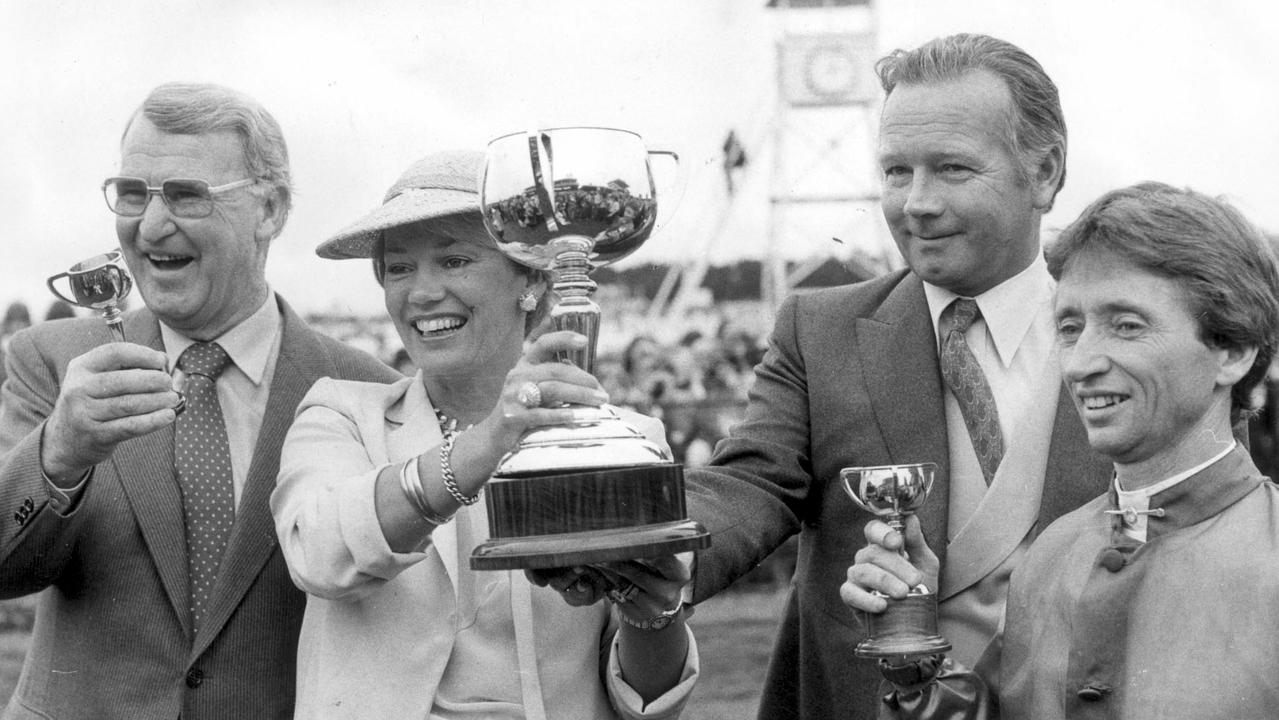 11/1980. Racehorse trainer Colin Hayes (left) with Robert Sangster and his wife Susan and jockey John Letts after winning the 1980 Melbourne Cup on Beldale Ball.