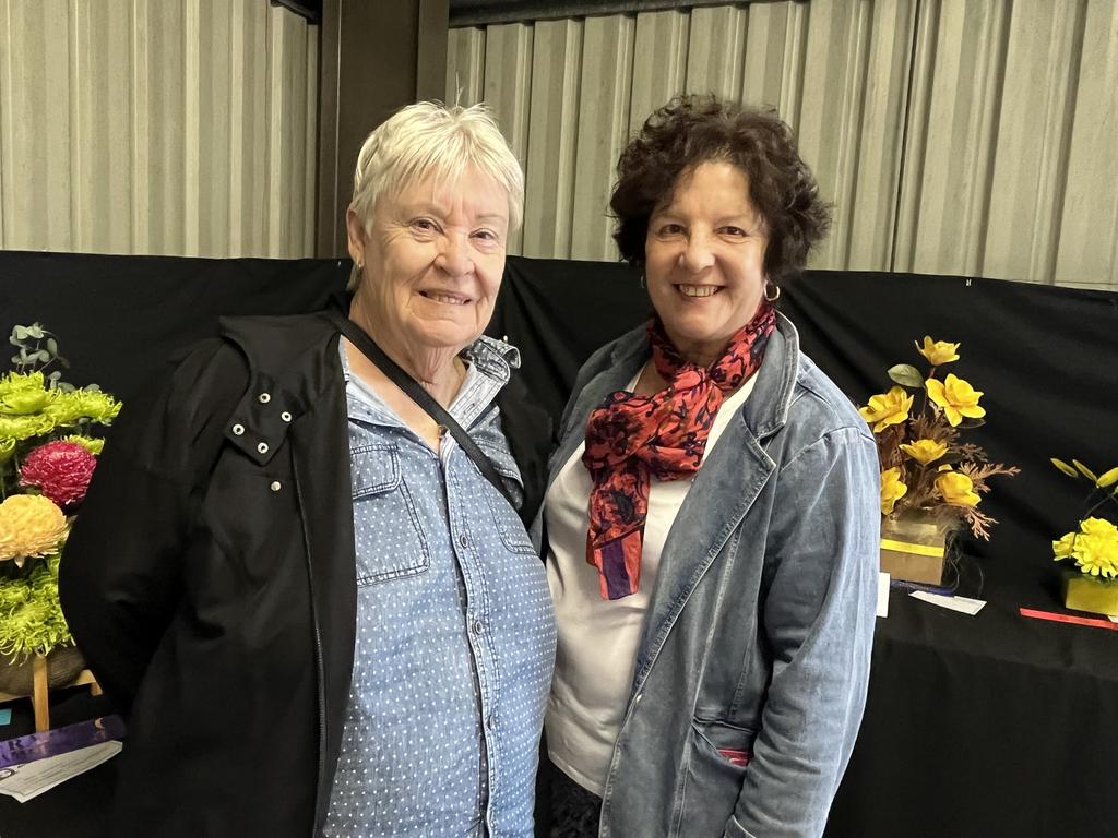 Ann Bell and Patti McBride at the floral display at the Fraser Coast Show.