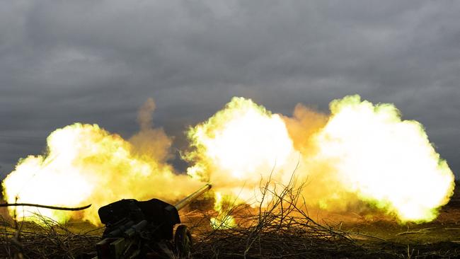 Ukrainian servicemen of an artillery unit fire towards Russian positions on the outskirts of Bakhmut, eastern Ukraine. Picture: AFP.