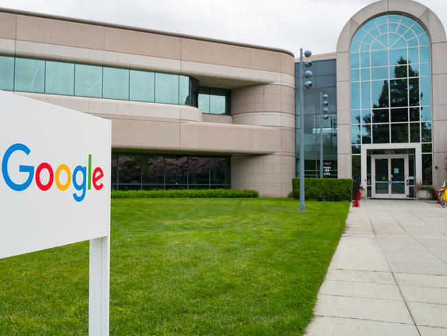 Logo with signage in front of Building 44, which houses employees working on the Android mobile phone operating system, at the Googleplex, headquarters of Google Inc in the Silicon Valley town of Mountain View, California, April 7, 2017. (Photo via Smith Collection/Gado/Getty Images).