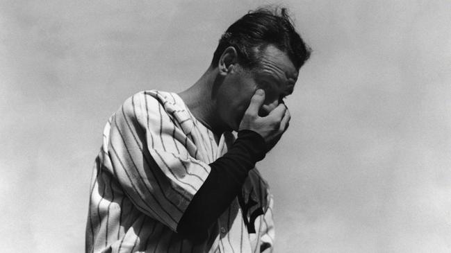 New York Yankees' star Lou Gehrig wipes away a tear during the sold-out tribute at Yankee Stadium in New York on July 4, 1939.