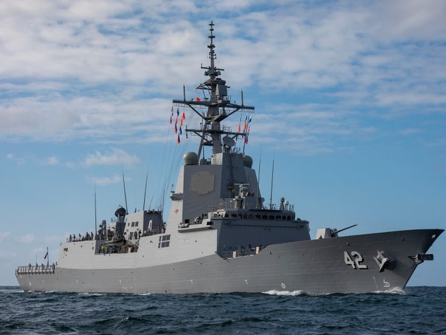 Air Warfare Destroyer NUSHIP Sydney sails through Sydney Heads and enters her namesake harbour for the first time on 27 March 2020. *** Local Caption *** NUSHIP Sydney arrived in her namesake city for the first time on 27 March 2020, 36 years to the day since the last warship to carry the name arrived in Sydney. The 147-metre long Air Warfare Destroyer came alongside her new homeport at Garden Island in Sydney following the transit from Osborne in South Australia where she was built. Sydney is the last of three Hobart Class vessels built for the Royal Australian Navy and is based on the Navantia F100 frigate design. She is equipped with advanced combat systems, providing the ship with the layered defensive and offensive capabilities required to counter conventional asymmetrical threats. Sydney will commission into the Royal Australian Navy in May 2020. Her sister ships Hobart and Brisbane commissioned in 2017 and 2018 respectively.