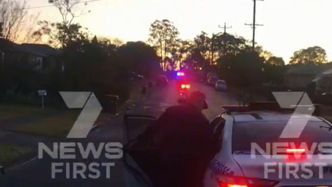 Specialist police forced open the door, attempted to Taser the man before shooting him. Picture: 7News