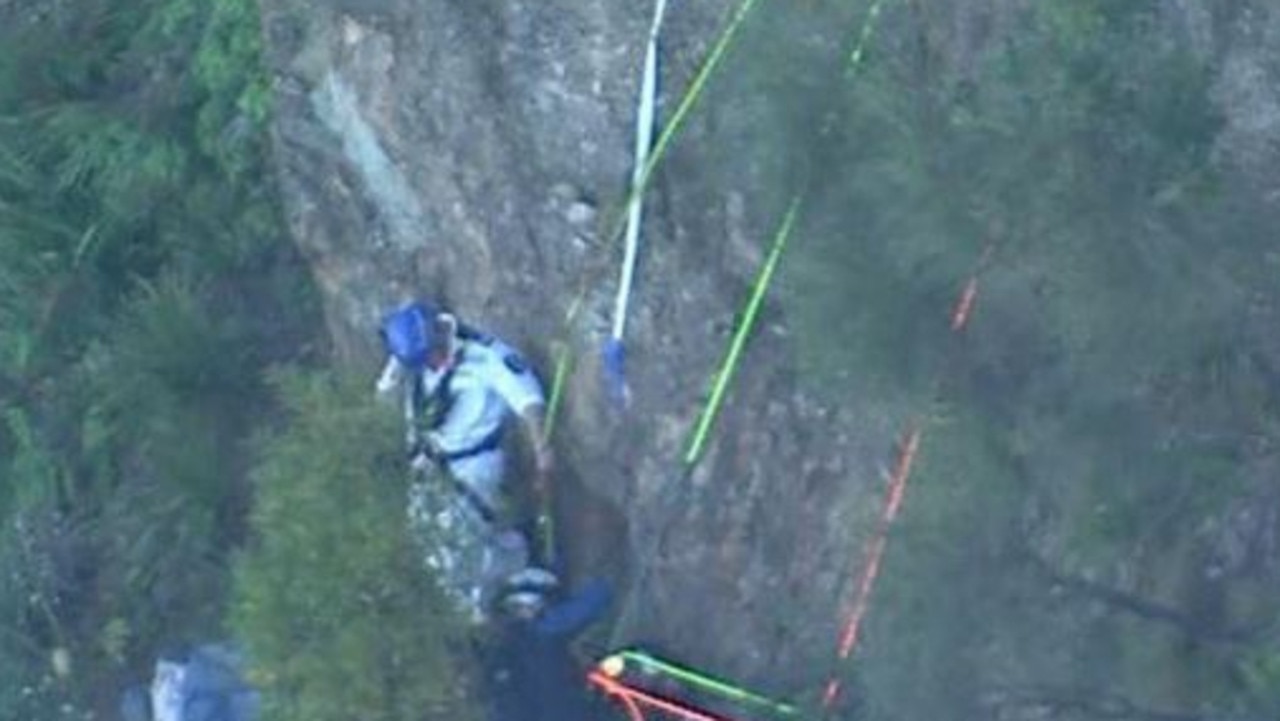Paraglider trapped for hours after crash