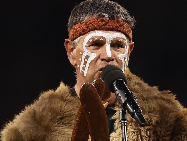 PERTH, AUSTRALIA - MAY 24: Dr Richard Walley performs the welcome to country during the round 11 AFL match between Walyalup (the Fremantle Dockers) and Collingwood Magpies at Optus Stadium, on May 24, 2024, in Perth, Australia. (Photo by Paul Kane/Getty Images)