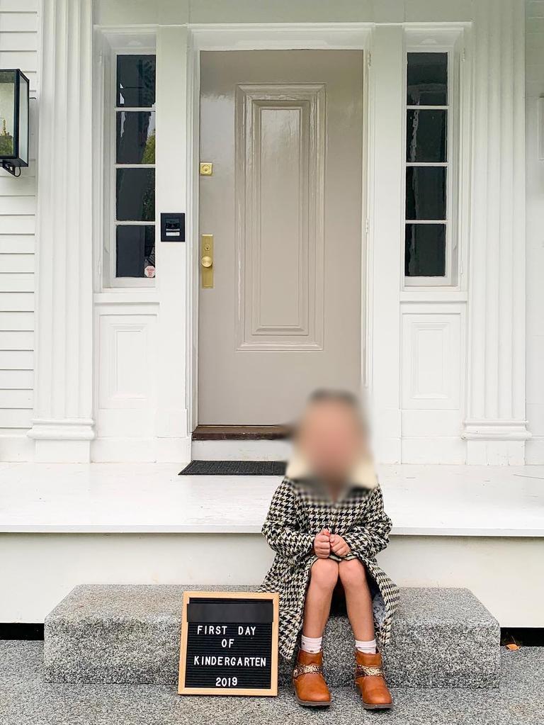 A child poses for the camera and is then posted online under #firstdayofkindergarten