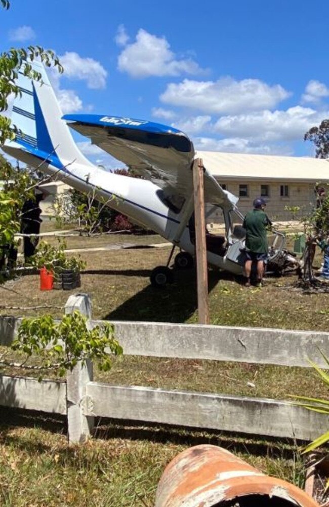 A woman has been taken to hospital after a light plane landed roughly in a Sunshine Coast back yard.