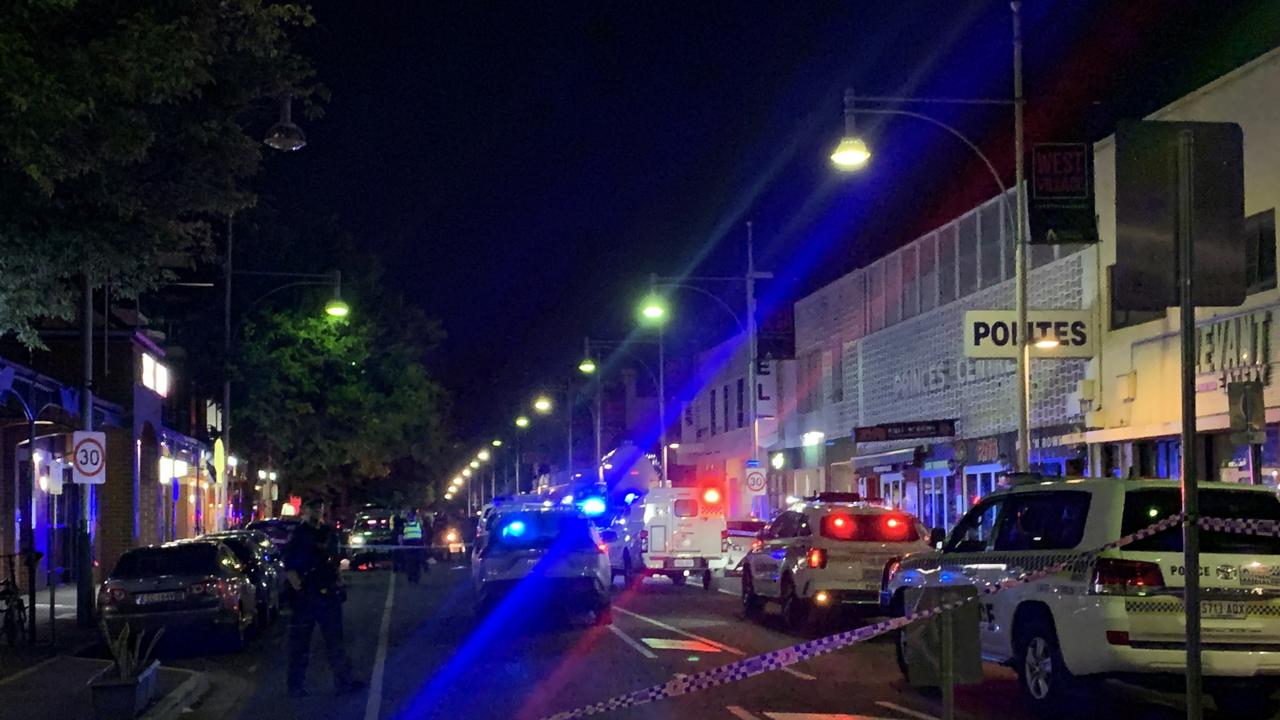 Police and ambulance crews at the scene. Picture: George Yankovich