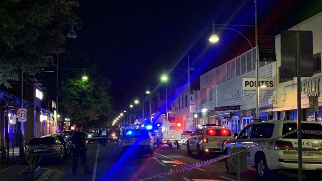 Police and ambulance crews at the scene. Picture: George Yankovich
