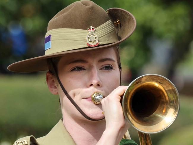 ADV NEWSANZAC Day MarchBugler during the service at the Cross of Sacrifice straight after the march at Pennington Gardens, North Adelaide.Image/Russell Millard Photography