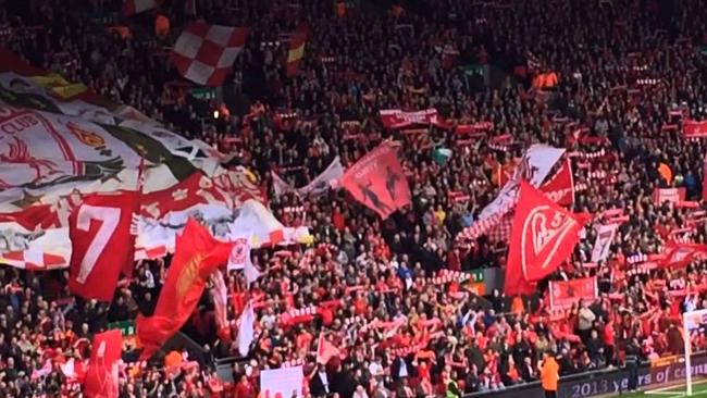 Liverpool fans on the Kop singing You'll Never Walk Alone