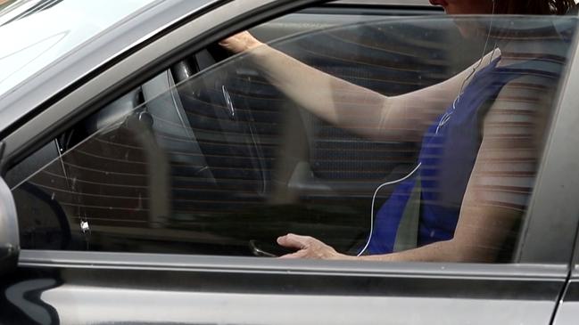 A person using their mobile phone while driving on the New South Head Road in Edgecliff last year. Picture: Sam Ruttyn