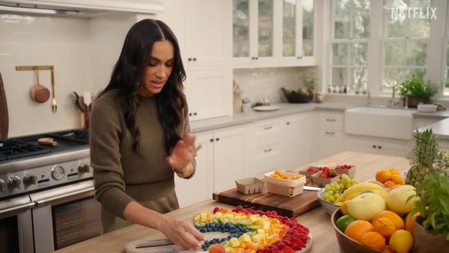 Meghan markle creates a rainbow fruit platter for the show. Picture: Netflix