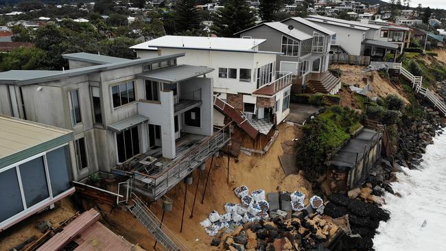 Homes along Ocean View Drive in Wamberal continue to teeter on the edge. Picture: Toby Zerna