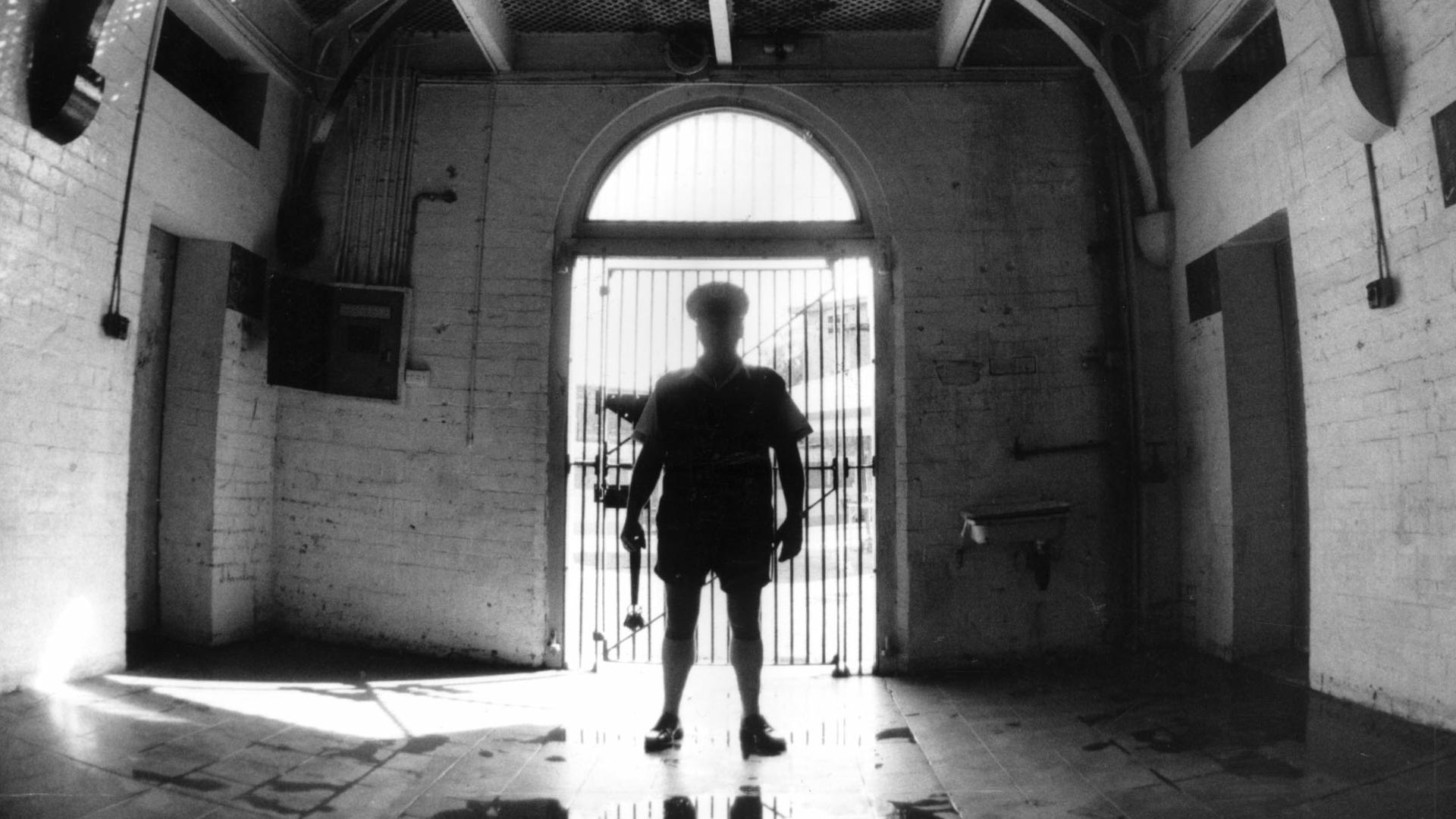 File/Pic/Fetting 27 May 1992 Raymond Bellis Custodian correction Officer in the infamous Division2 of Boggo Road Prison. prisons prisoners guard silhouette buildings interior 35/G/10850-fr8 Dutton Park Brisbane qld