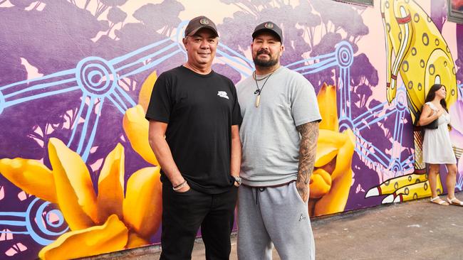 Jason and Trent Lee in front of NT-themed mural unveiled in Los Angeles.