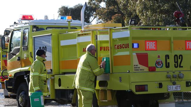 Firefighters from the ACT arrive to help at the Coolaroo fire. Picture: David Crosling