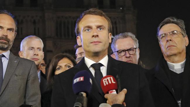 French President Emmanuel Macron says the Notre Dame will be rebuilt. Picture: AP 