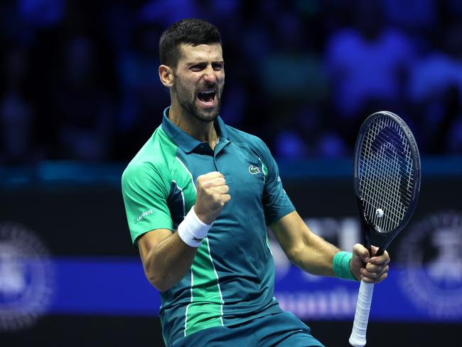 TURIN, ITALY - NOVEMBER 19: Novak Djokovic of Serbia celebrates winning match point against Jannik Sinner of Italy in the Men's Singles Finals between Jannik Sinner of Italy and Novak Djokovic of Serbia on day eight of the Nitto ATP Finals at Pala Alpitour on November 19, 2023 in Turin, Italy. (Photo by Clive Brunskill/Getty Images)