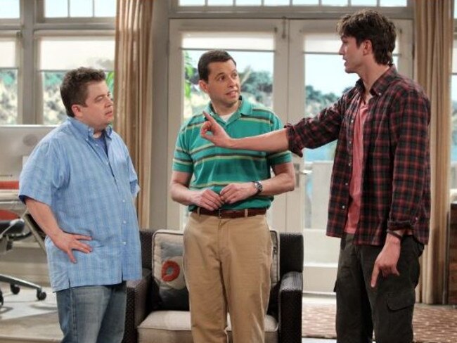 Oswalt with Jon Cryer and Ashton Kutcher in Two and a Half Men.