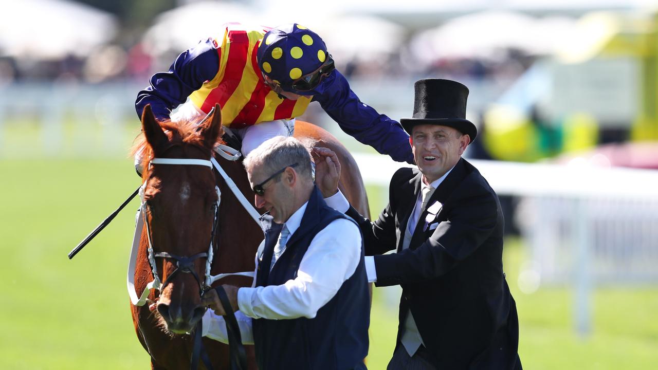 Chris Waller and James McDonald celebrate with the champion sprinter. Picture: Alex Livesey/Getty Images