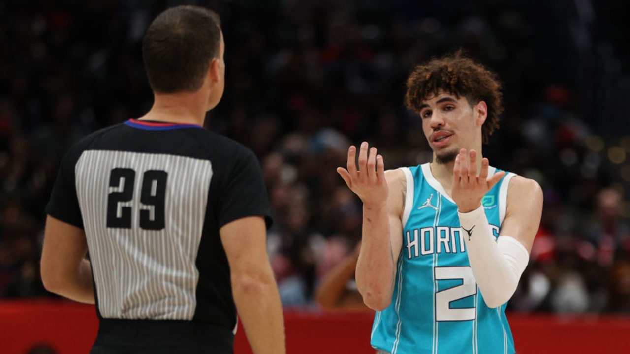 WASHINGTON, DC - NOVEMBER 22: LaMelo Ball #2 of the Charlotte Hornets reacts against the Washington Wizards during the first half at Capital One Arena on November 22, 2021 in Washington, DC. NOTE TO USER: User expressly acknowledges and agrees that, by downloading and or using this photograph, User is consenting to the terms and conditions of the Getty Images License Agreement. (Photo by Patrick Smith/Getty Images)
